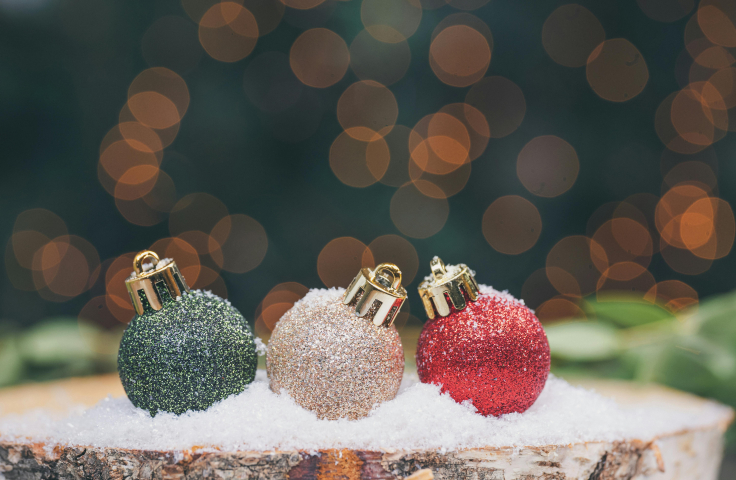 Christmas baubles with glitter representing microplastics from the holiday season